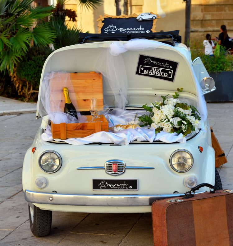 Wedding phtobooth decor setup with a White vintage Fiat